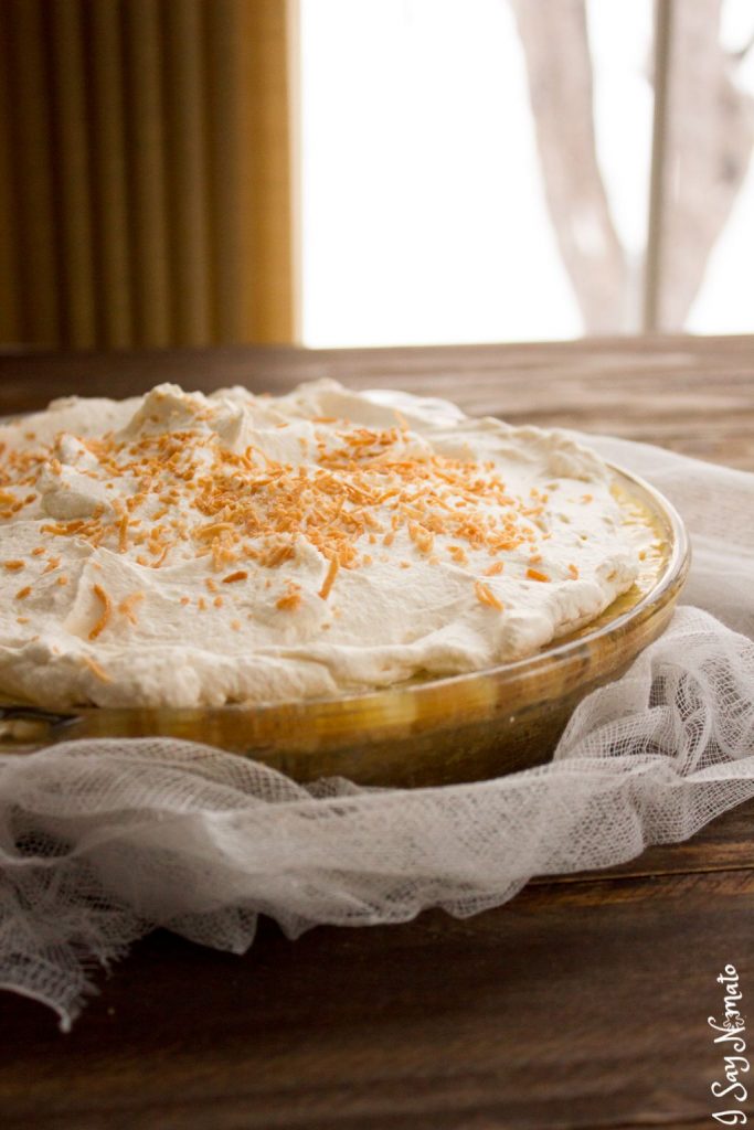 This Coconut Cream Pie with is a twist on a classic. Hearty coconut cream filling topped with whipped cream and toasted coconut, all on top of an oatmeal cookie crust for a little added crunch! 