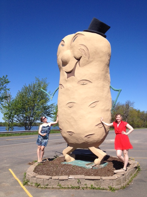 Me and my sister with the giant potato in Fredericton